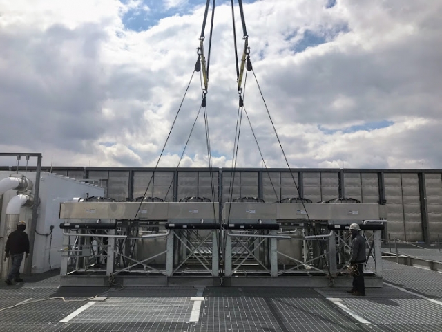 crane_setting_down_rooftop_units_telx_digital_realty_HVAC_nj_Crane