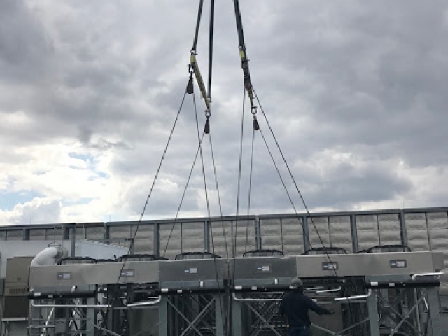 crane_setting_down_rooftop_units_telx_digital_realty_HVAC_nj_Crane